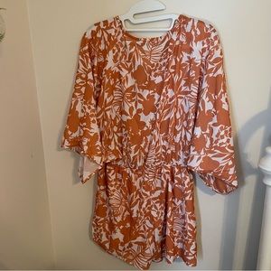 Never worn long sleeve romper. Size:medium